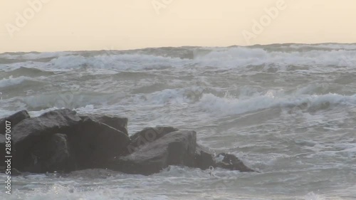 waves crashing on rocks