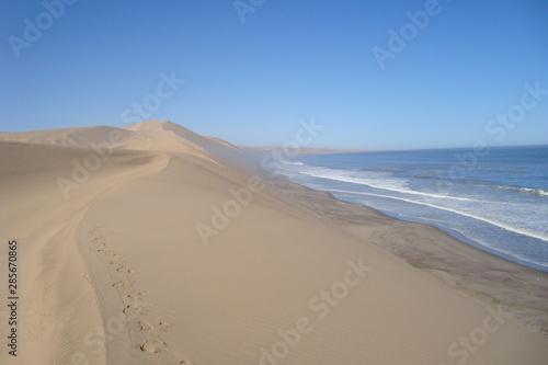 Where the Desert meets the Sea. Photograph of Sandwich Harbour  South of Walvis Bay  Namibia.