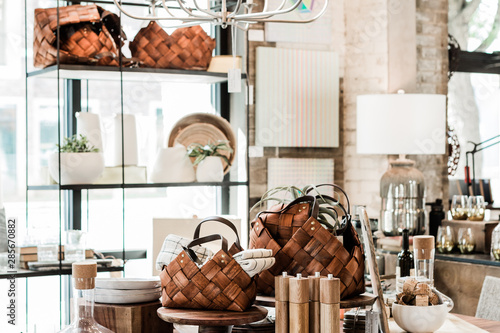 wooden table with modern home goods, unique home decoration store photo