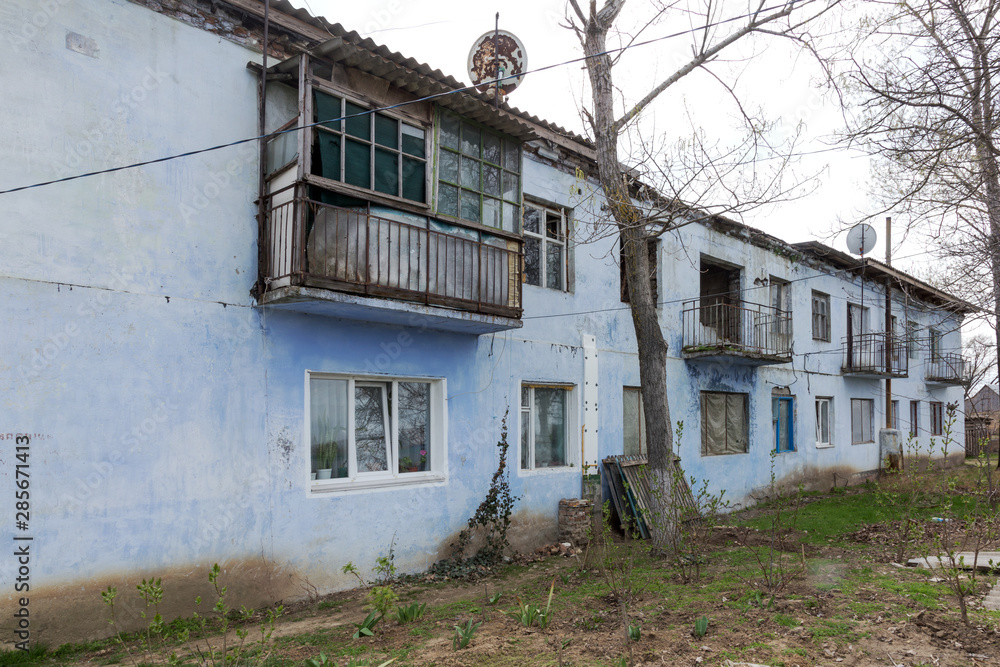 Homes in poor neighborhood where poor people live. Destruction of old houses, earthquakes, economic crisis, abandoned houses. Living in broken, unusable house is poor quarter. Odessa, Ukraine, 2019 Homes in poor neighborhood where poor people live. Destruction of old houses, earthquakes, economic crisis, abandoned houses. Living in broken, unusable house is poor quarter. Odessa, Ukraine, 2019