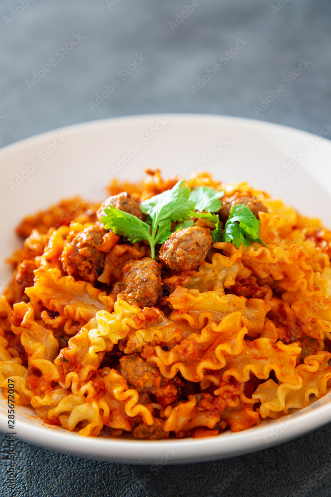 tasty penne with Meat ball and tomato sauce