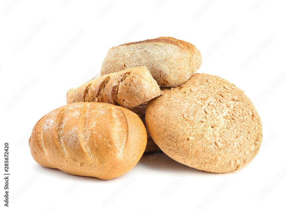 Loaves of different breads on white background Loaves of different breads on white background