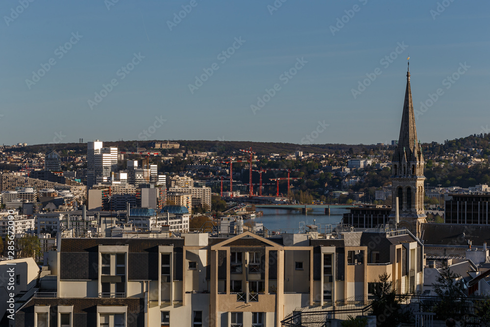 View on the church of Saint Cloud and the river Seine in the suburbs of Paris, France