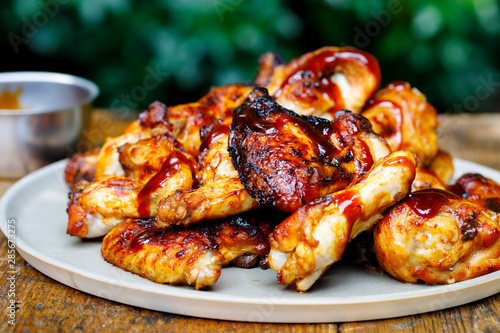 Barbecue chicken wings and drumsticks with sauce