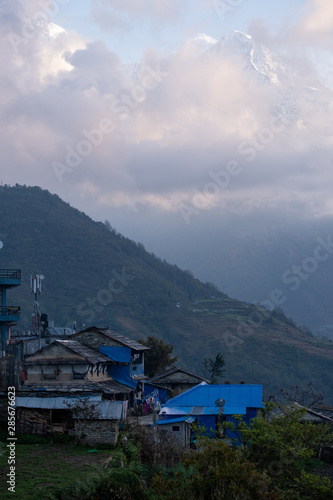 Houses in mountain village and field, Annaourna region, Nepal. Outdoor, alternative. © NIPATHORN