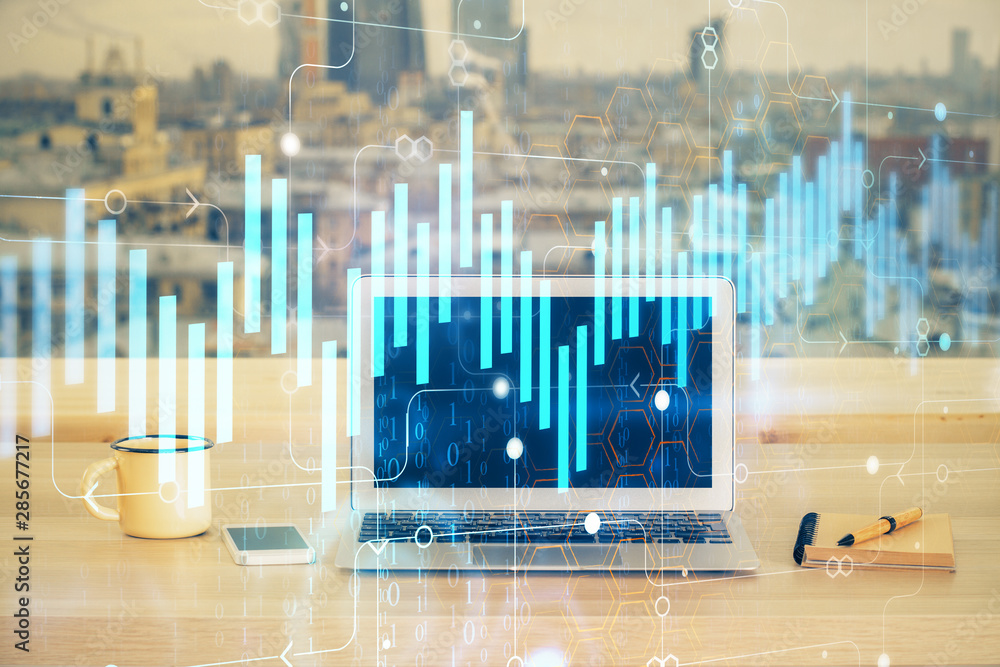 Double exposure of forex chart and work space with computer. Concept of international online trading. Double exposure of forex chart and work space with computer. Concept of international online trading.