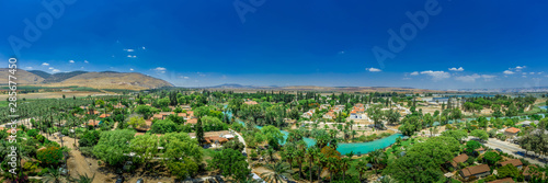 Turquoise Amal river running through the traditionally agriculture based collective community Kibbutz Nir David in Israel 