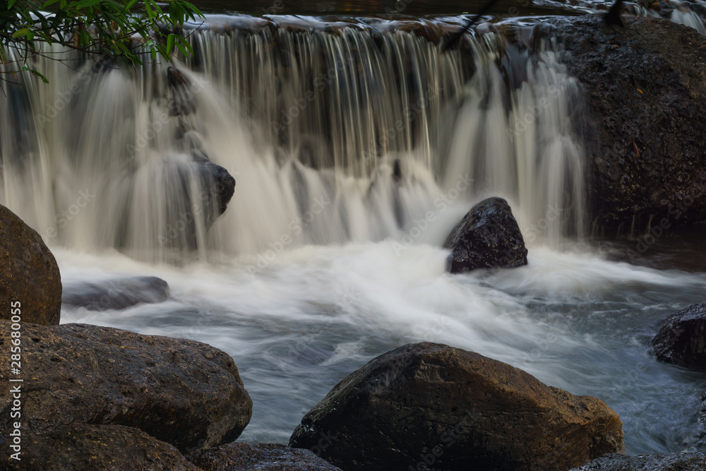 Beautiful rock waterfall in forest Beautiful rock waterfall in forest