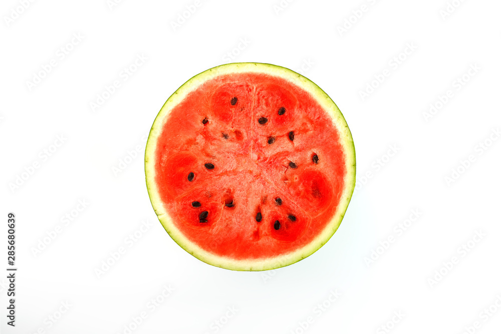 Half of juicy, red watermelon on a white background, texture of juicy pulp and mesmeses of ripe watermelon Half of juicy, red watermelon on a white background, texture of juicy pulp and mesmeses of ripe watermelon