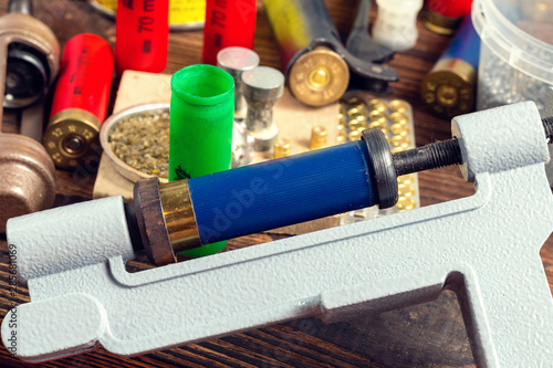 Canvas Print Shotgun shells reloading process with special reload equipment