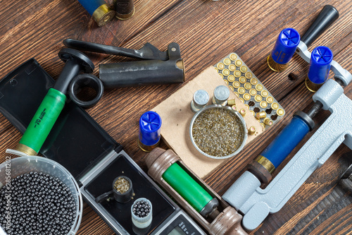 Canvas Print Shotgun shells reloading process with special reload equipment