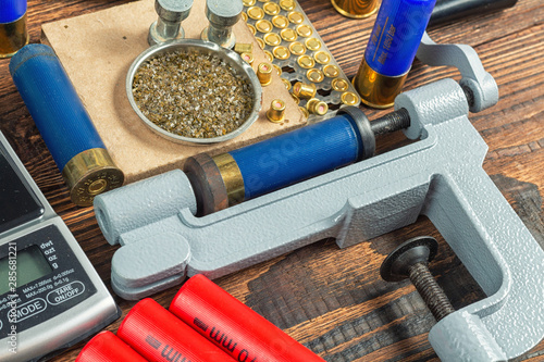 Canvas Print Shotgun shells reloading process with special reload equipment