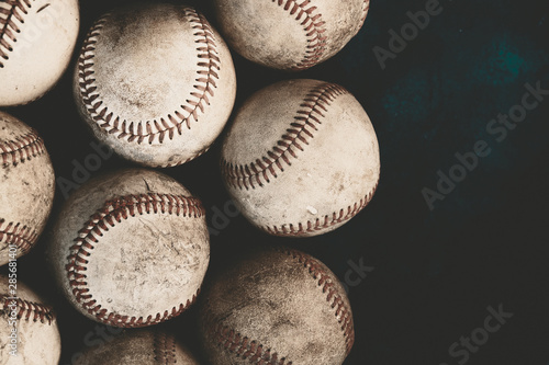 Photography Group of used baseballs on background for graphic with room for copy or text