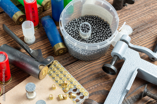 Canvas Print Shotgun shells reloading process with special reload equipment