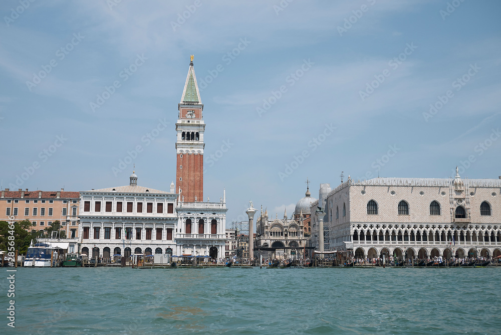 Venice, Italy - July 02, 2019 :  View of Piazza San Marco and palazzo Ducale from the ferry boat