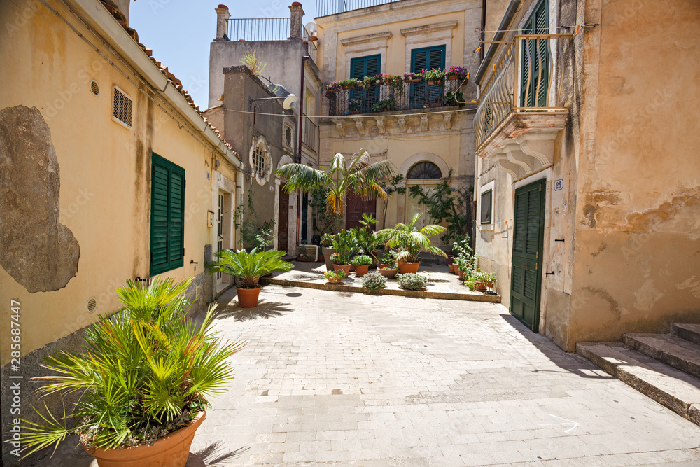 Small courtyard with succulents in Sicily, Italy.