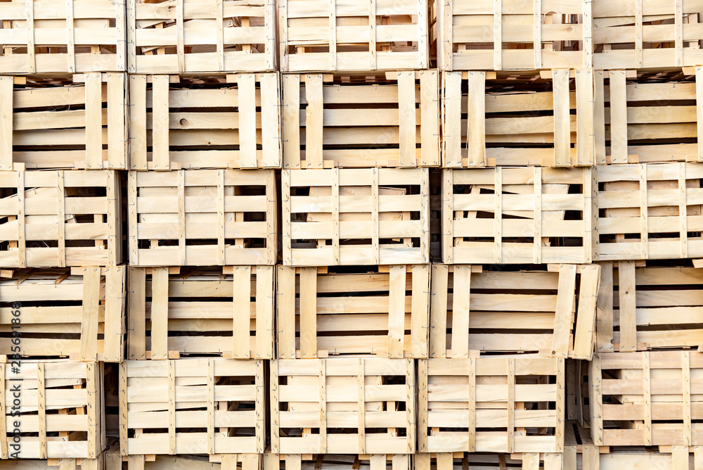 Bunch of empty wooden boxes stack at each other. Bunch of empty wooden boxes stack at each other.