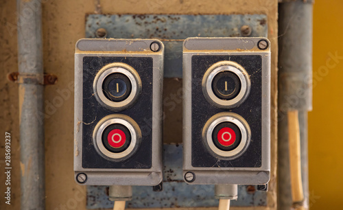 Push buttons, old retro industrial control panel. Start, stop concept