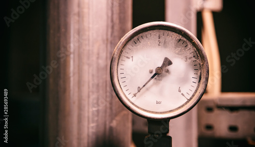 Industrial high pressure gas meters, pipelines and valves on blur background