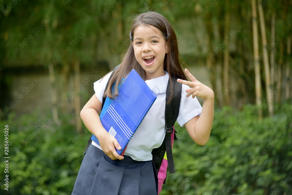 Young Filipina Student Child Winner Wearing Uniform With Notebooks Young Filipina Student Child Winner Wearing Uniform With Notebooks