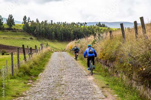 Cayambe volcano and cyclists
