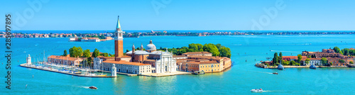 Landscape of Venice, Italy. Aerial panoramic view of San Giorgio Maggiore island in Venetian lagoon. Horizontal banner of Venice in the sea.
