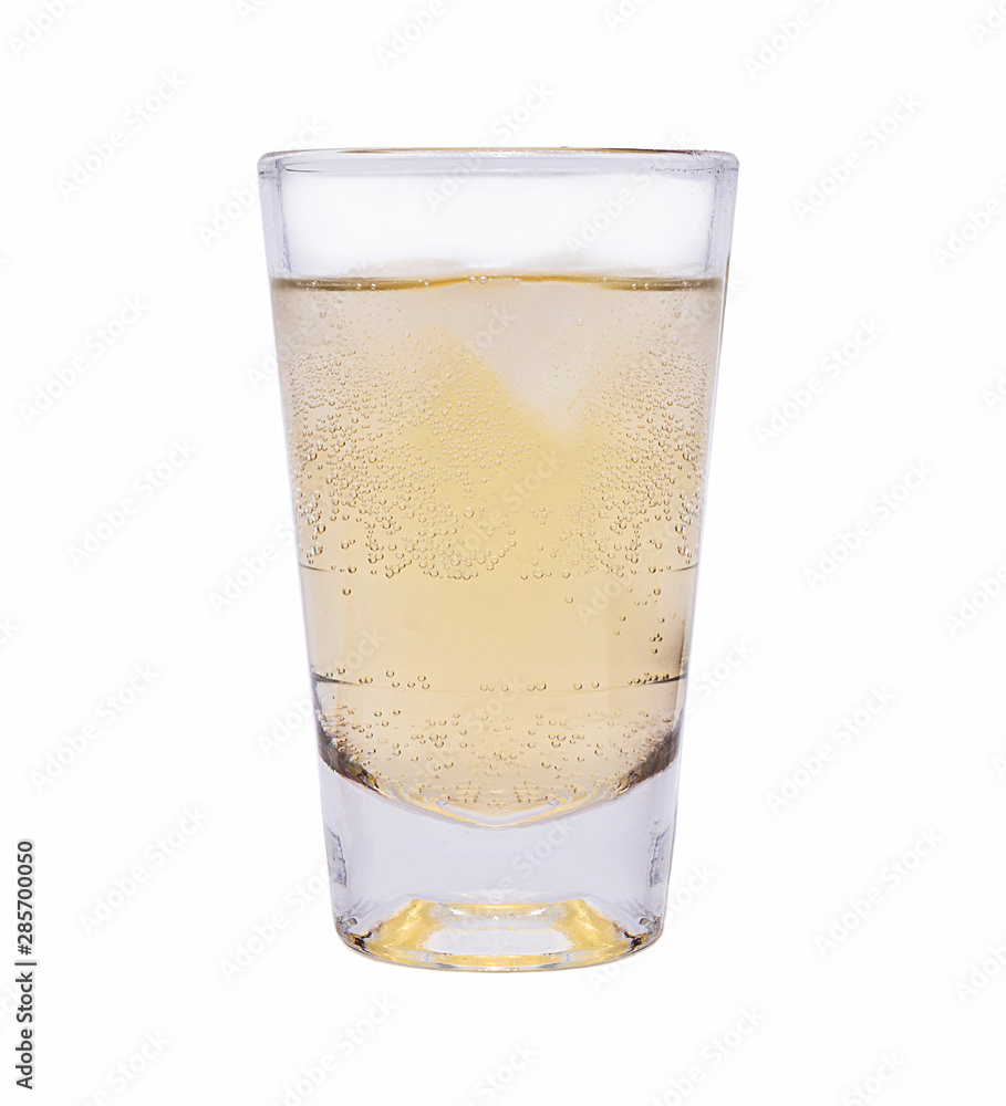 Glass of Apple Spritzer (Apfelschorle), Homemade Apple Spritzer with white background. Typical drink from germany, austria and europe. Glass of Apple Spritzer (Apfelschorle), Homemade Apple Spritzer with white background. Typical drink from germany, austria and europe.