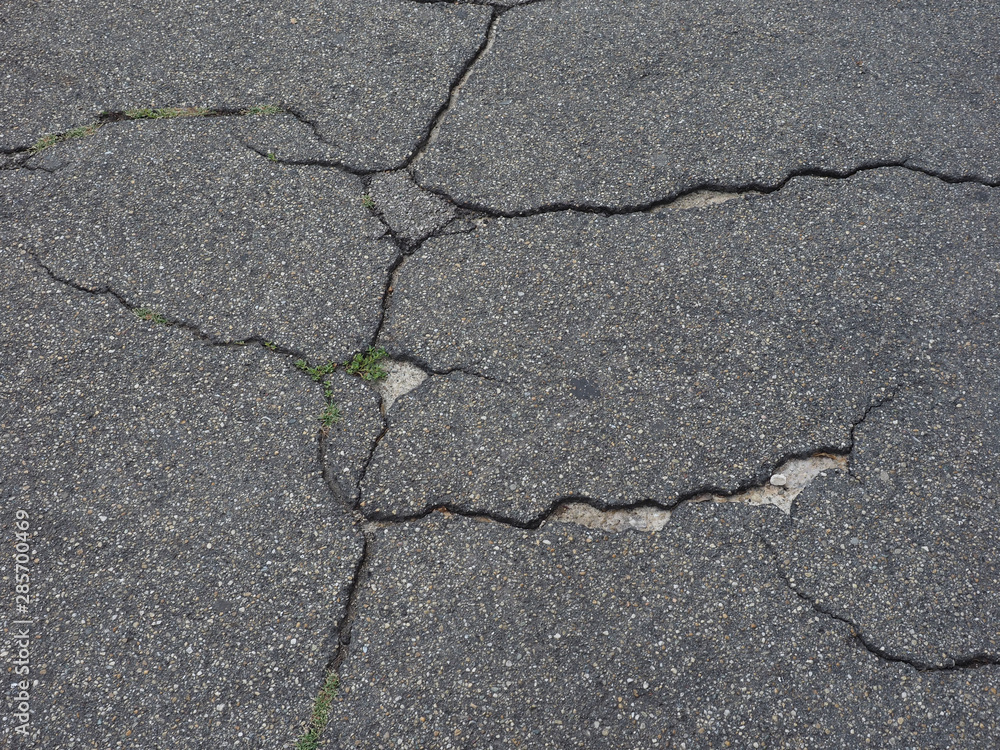 Obraz premium cracked tarmac texture background