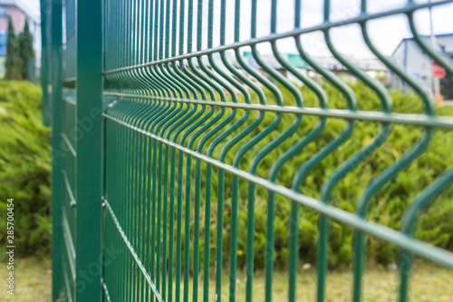 Green sectional steel fence
