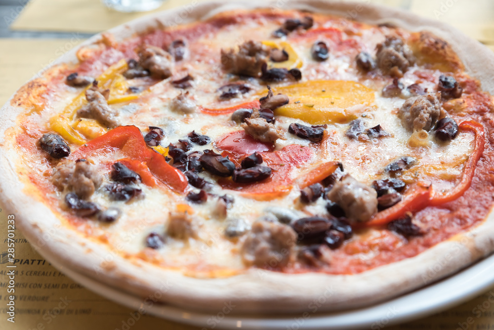 Neapolitan pizza sausage with peppers and mushrooms Neapolitan pizza sausage with peppers and mushrooms