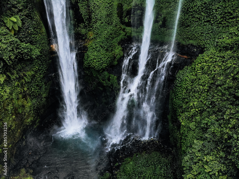 Obraz premium Aerial view of Sekumpul waterfall on Bali island Indonesia - travel and nature background. Drone photo