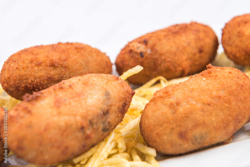 Homemade croquettes and French fries Homemade croquettes and French fries