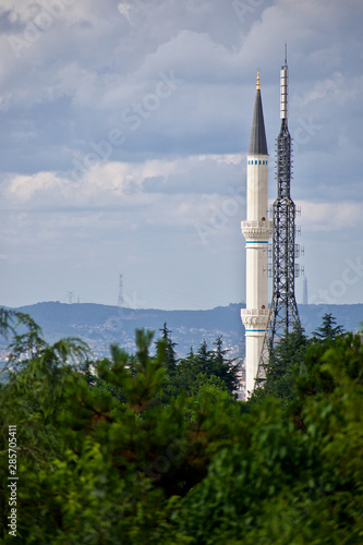 Lighthouse mosque with antennas