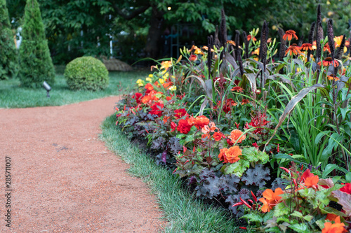 Landscape in the summer. Landscaping with flower beds