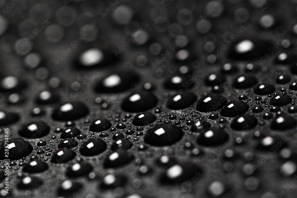 abstract water drops on a dark black  background