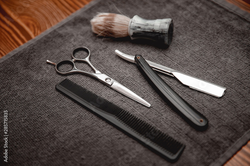 Barber shop background for men beauty salon, hairdresser tools scissors, razor, comb, copy space