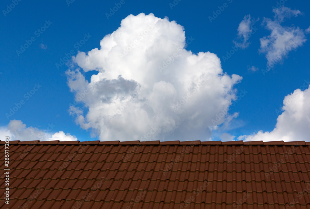 Tiles roof and sky on sunny day. Tiles roof and sky on sunny day.