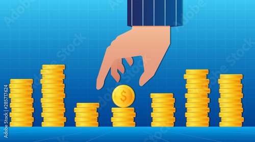 Human hand and money coins. Concept of saving money. Pile of coins on a blue background.