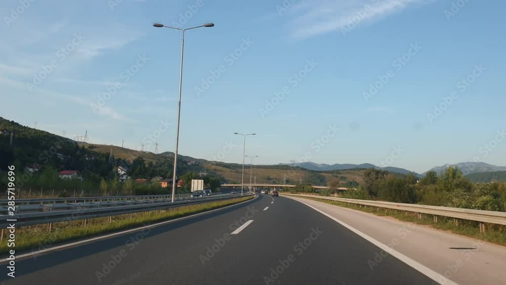 Driving car at the sunny day on the highway. Driving car at the sunny day on the highway.