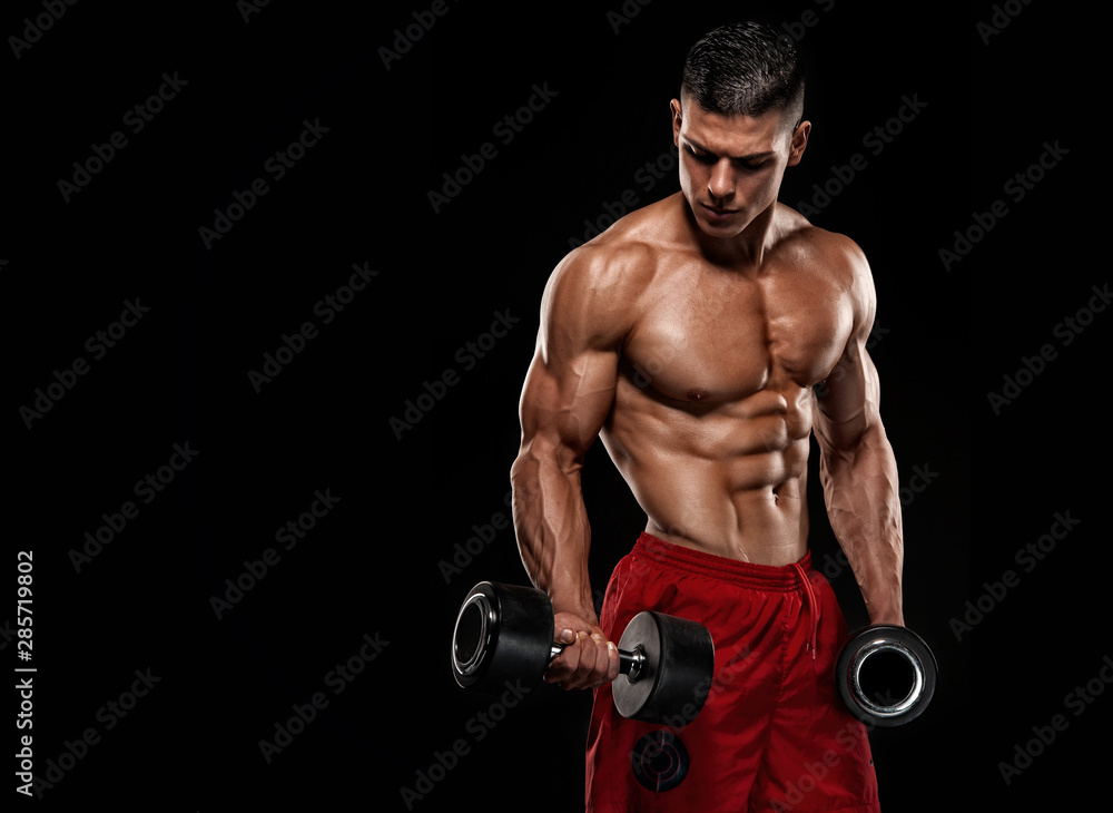 Shirtless Muscular Men Exercise With Weights