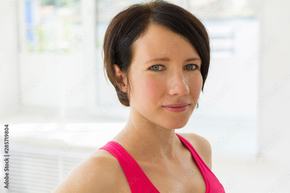 portrait of a young sportswoman in special clothes