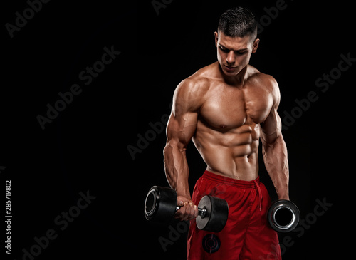 Shirtless Muscular Men Exercise With Weights