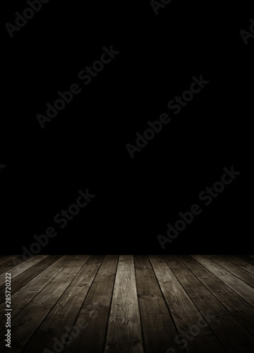 wooden planks leading into the dark.
