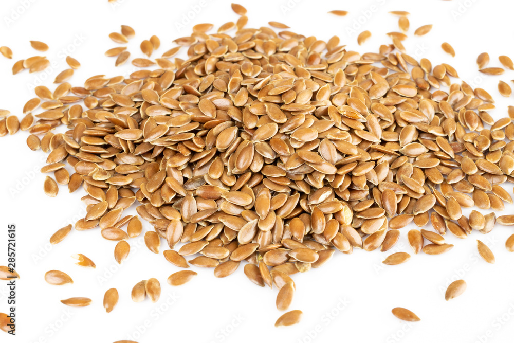 Linseeds. Flax seeds isolated on white background. Top view Linseeds. Flax seeds isolated on white background. Top view