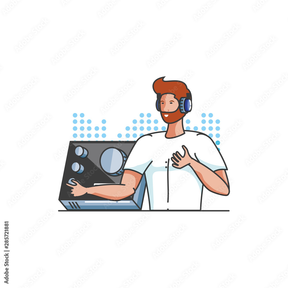 young man with earphones and audio console