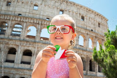 Photography Girl Tourist In Front Of Colosseum