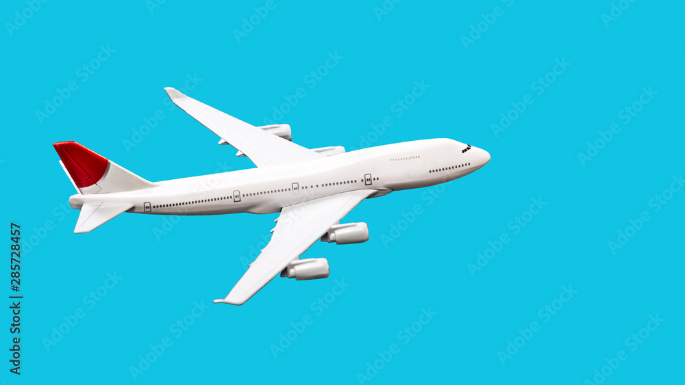 Mini airplane model with on blue background Mini airplane model with on blue background