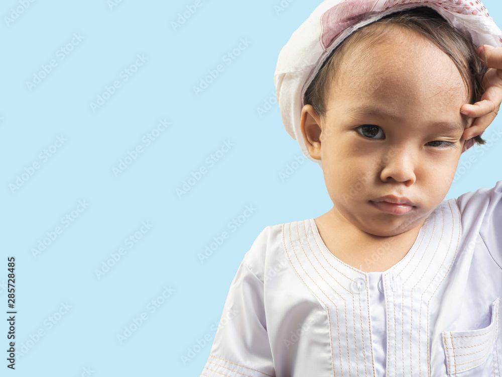 Muslim boy in a dress , isolate background Muslim boy in a dress , isolate background