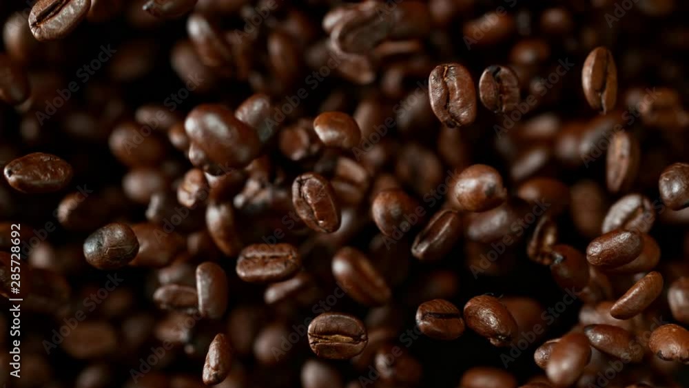 Super Slow Motion Shot of Exploding Premium Coffee Beans Towards the Camera at 1000fps. Shooted with High Speed Cinema Camera at 4K. Super Slow Motion Shot of Exploding Premium Coffee Beans Towards the Camera at 1000fps. Shooted with High Speed Cinema Camera at 4K.