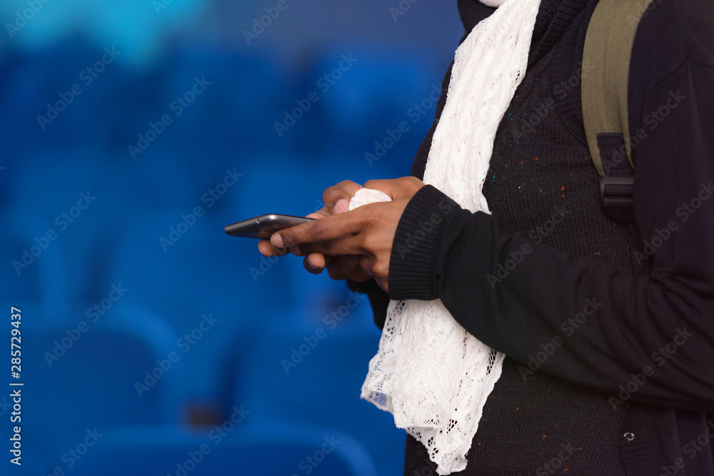 African american muslim  business womanusing phone after presentation for business people, multiracial and multiethnic business peoople at conference meeting room.